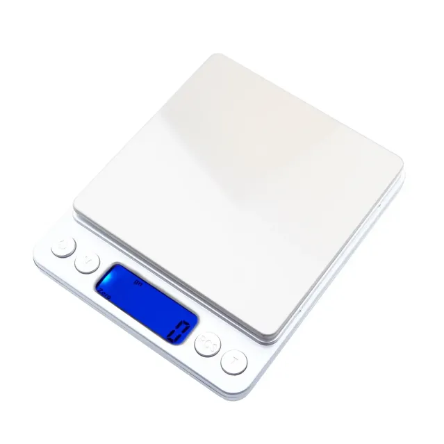 a white electronic scale with a blue screen