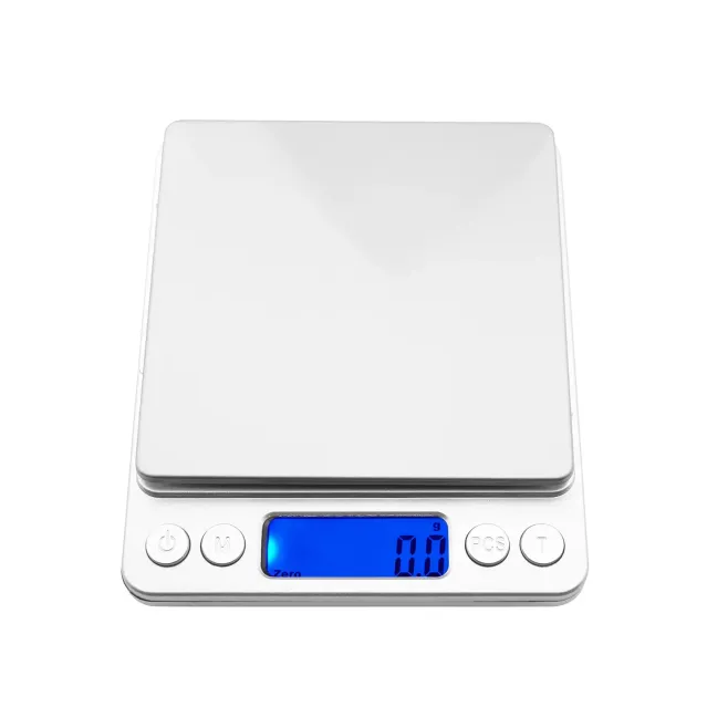 a white electronic scale with a blue screen